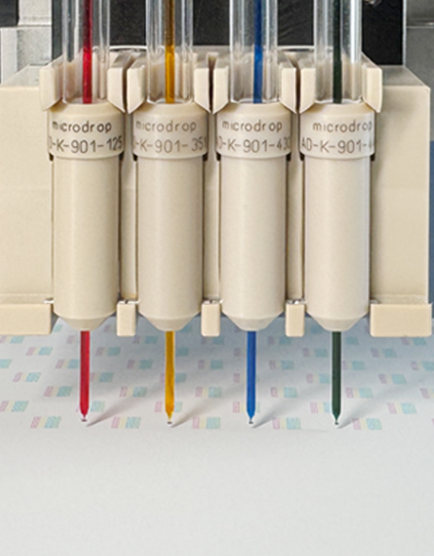 Microdispensing technology for lateral flow assay manufacturing